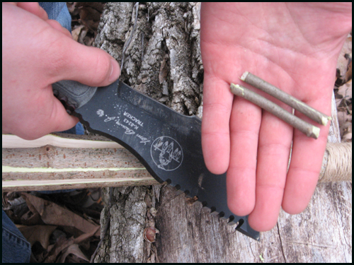Spreader Twigs Now find and carve two small twigs that are just a bit longer than the width of the sapling.